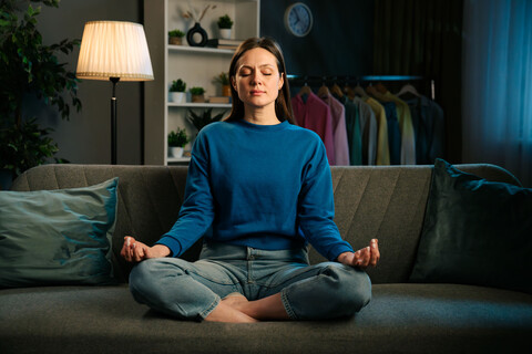 Woman Practicing Meditation in a Calm Home Environment